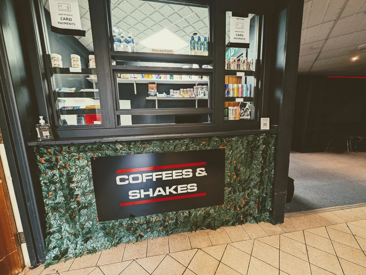 Coffees & Shakes counter at reception with drinks and supplements