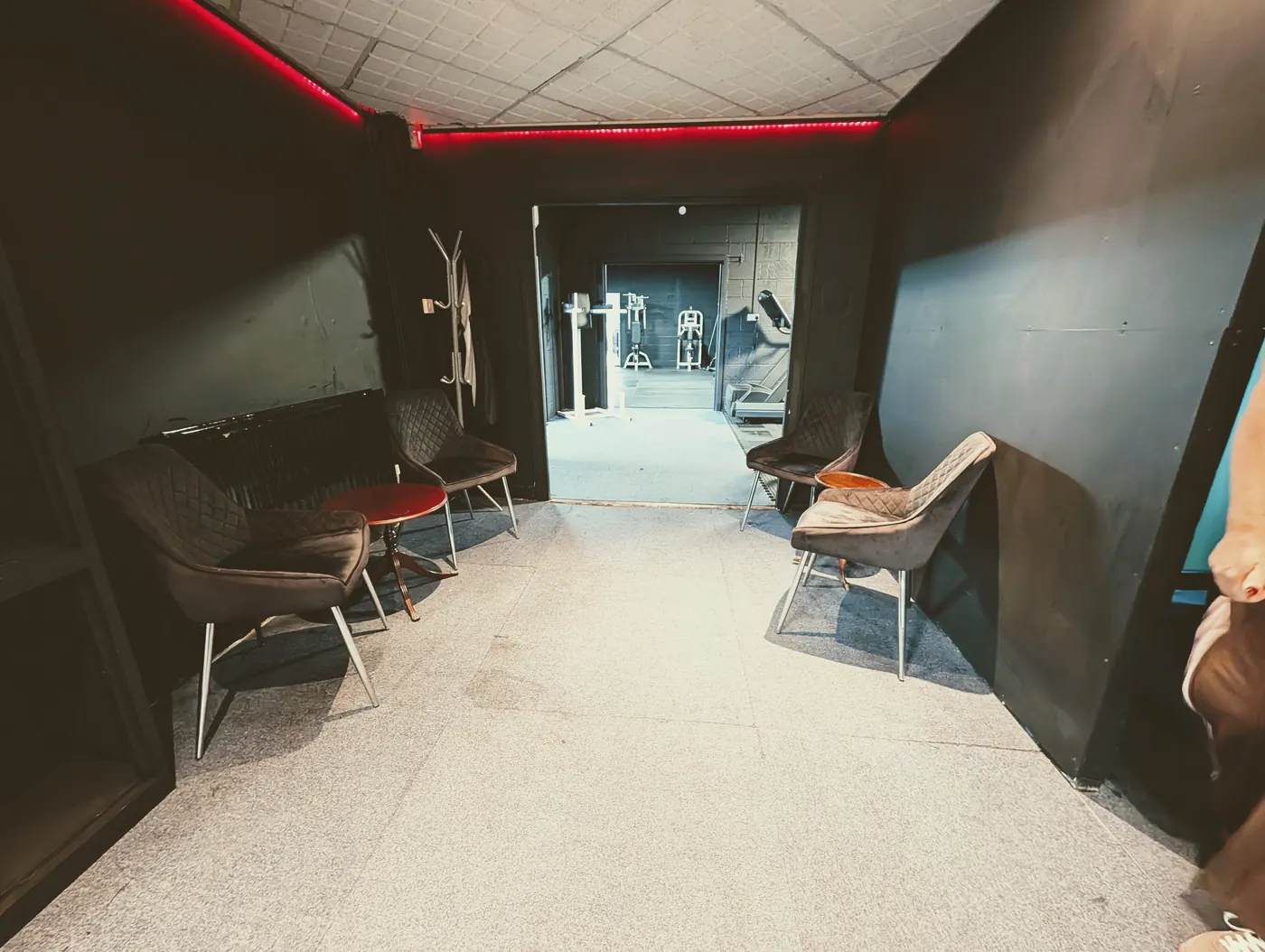 Chill-out lounge with red LED lighting and seating