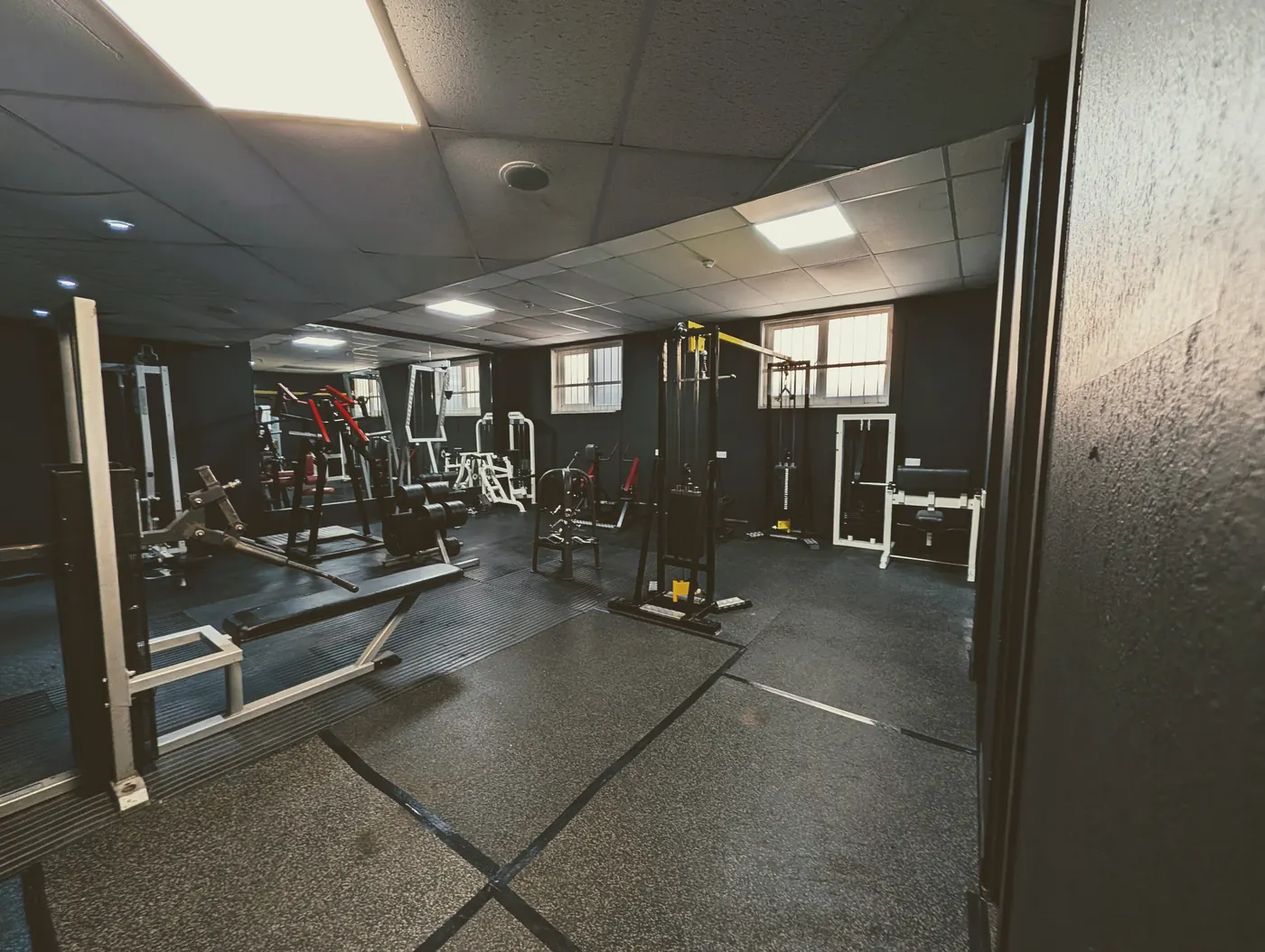 Resistance machines and benches in a second training area